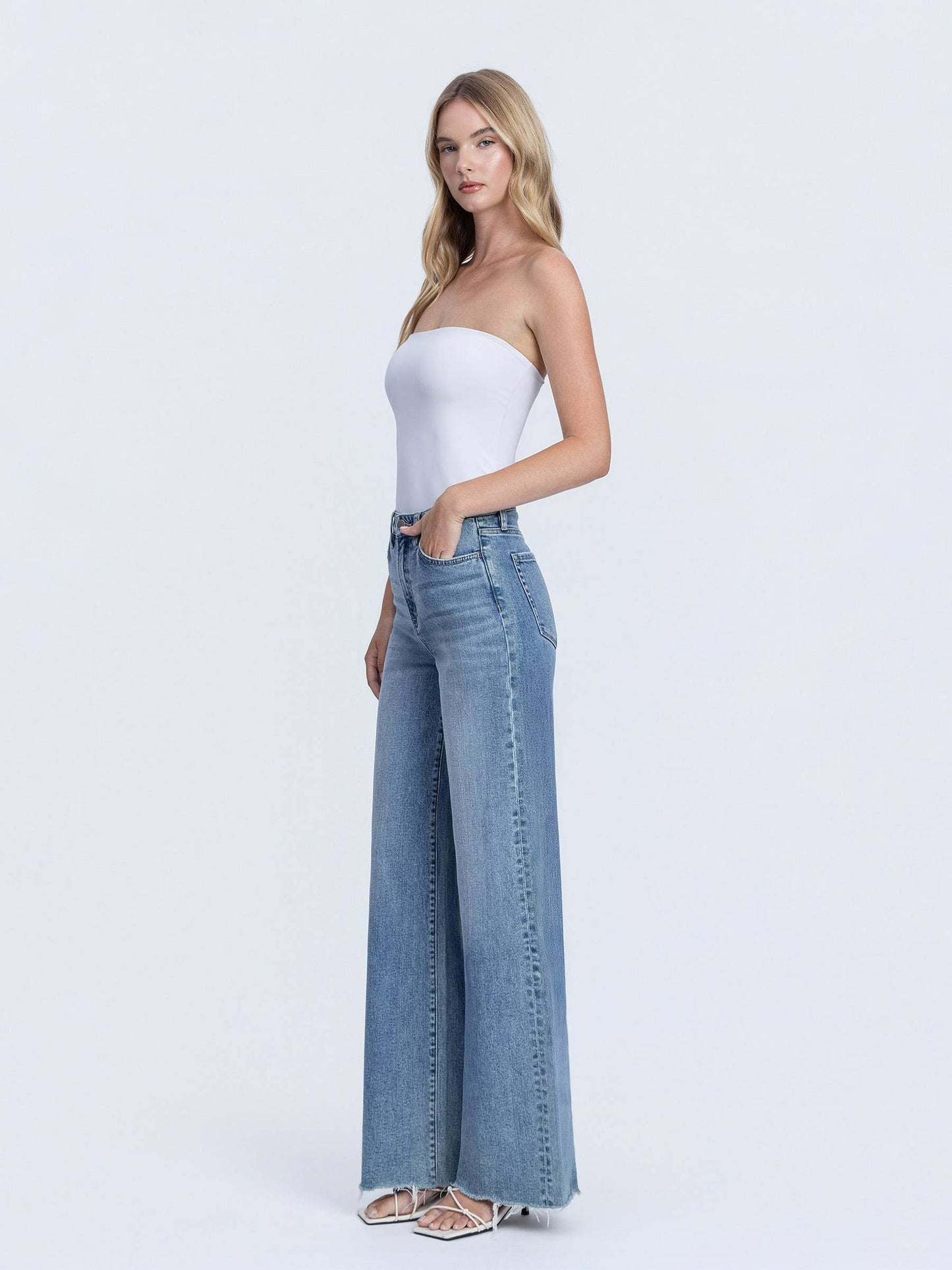 SUPER HIGH RISE MEDIUM WASH RAW HEM WIDE LEG