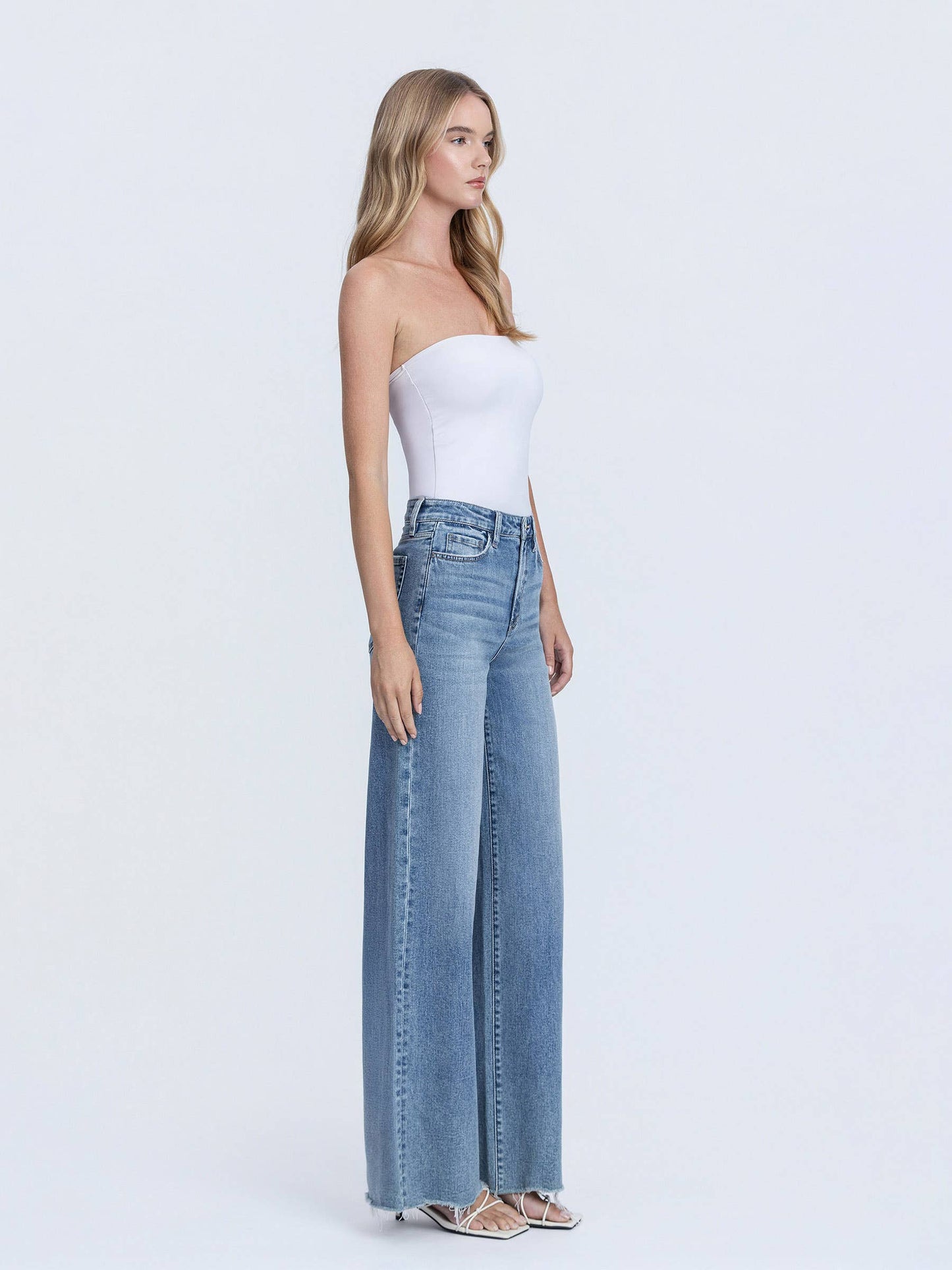 SUPER HIGH RISE MEDIUM WASH RAW HEM WIDE LEG