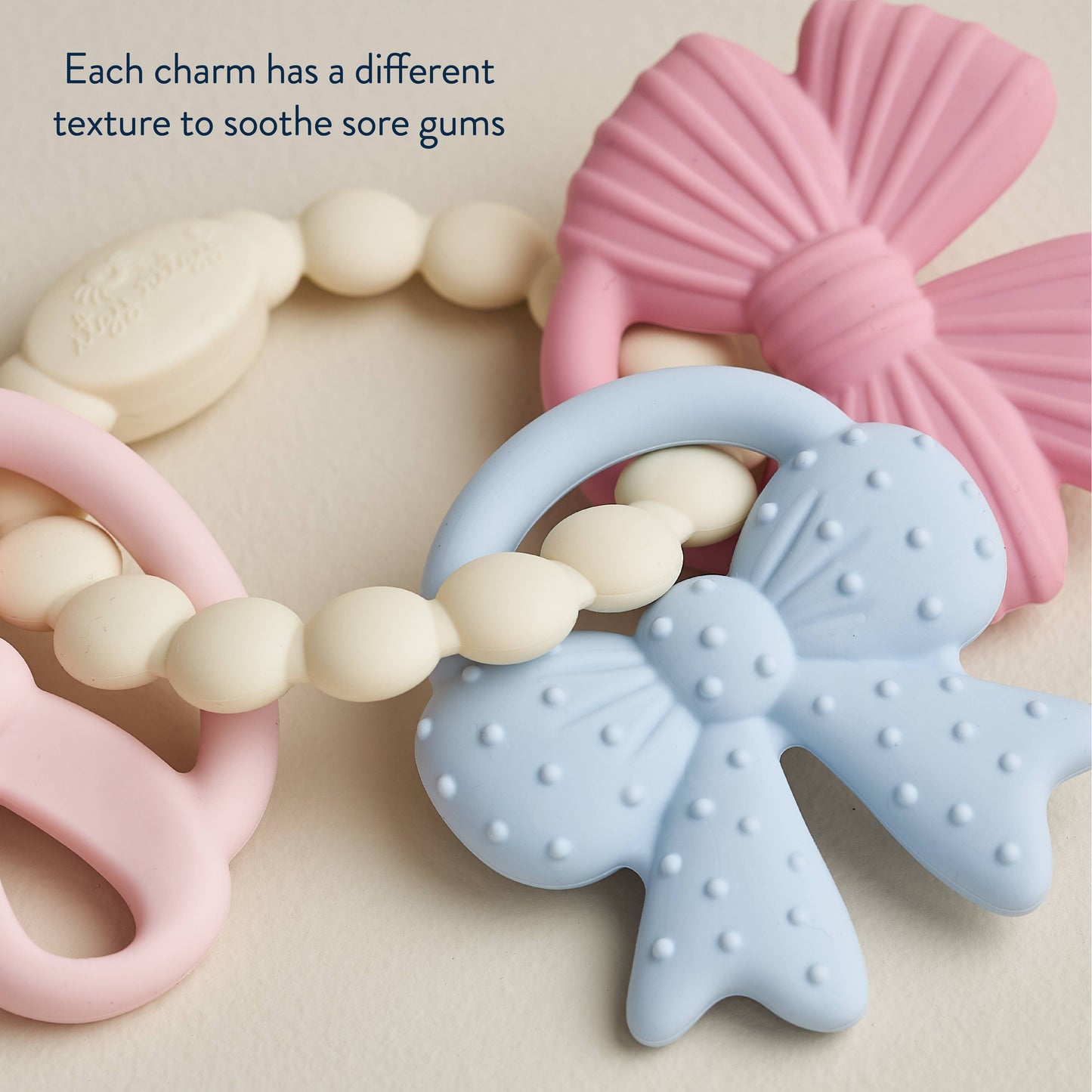 Itzy Trio Bow Teether