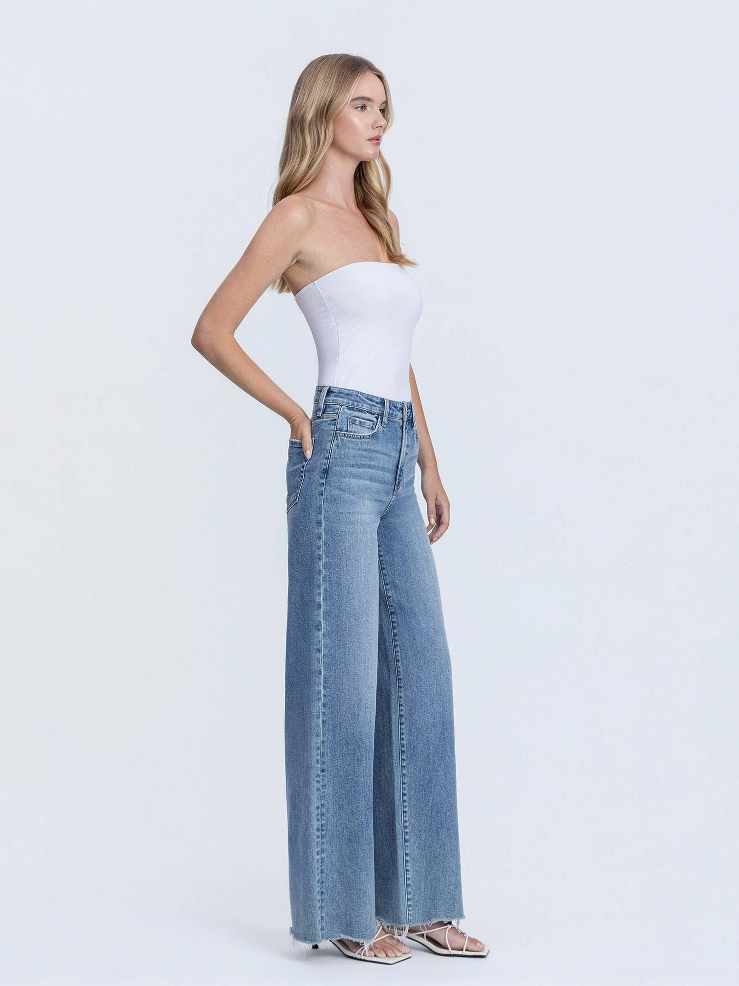 SUPER HIGH RISE MEDIUM WASH RAW HEM WIDE LEG